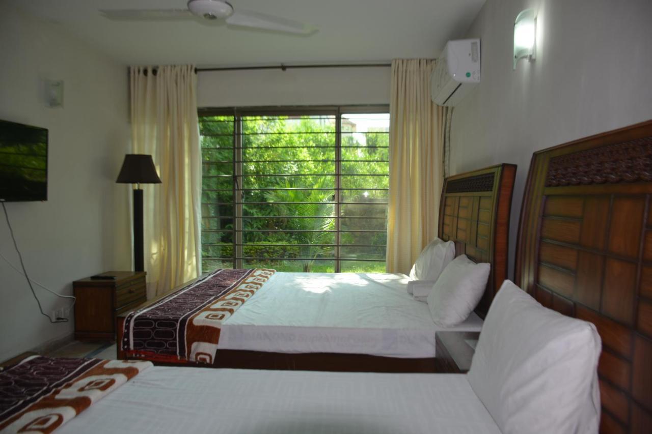 The Travelers Den Hotel อิสลามาบัด ภายนอก รูปภาพ