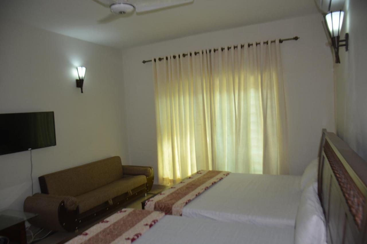 The Travelers Den Hotel อิสลามาบัด ภายนอก รูปภาพ